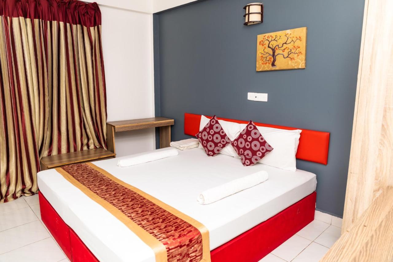 The G Ten Holiday Inn هولهومالي المظهر الخارجي الصورة